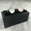 Boutons de manchette ronds nacre et or
