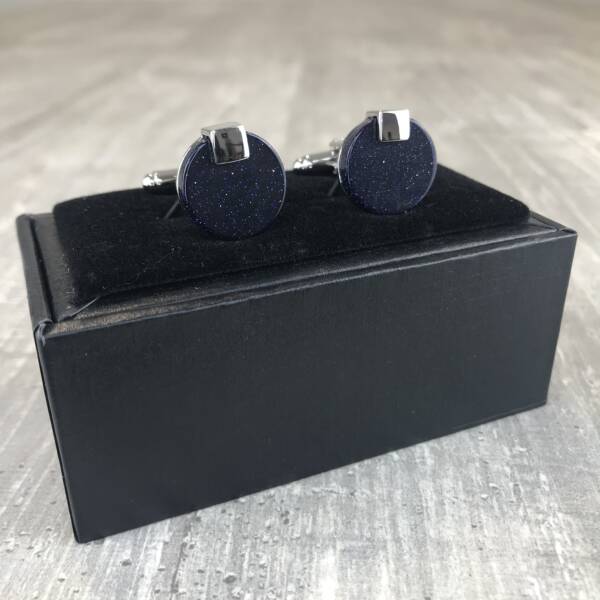 Boutons de manchette bleus pailletés