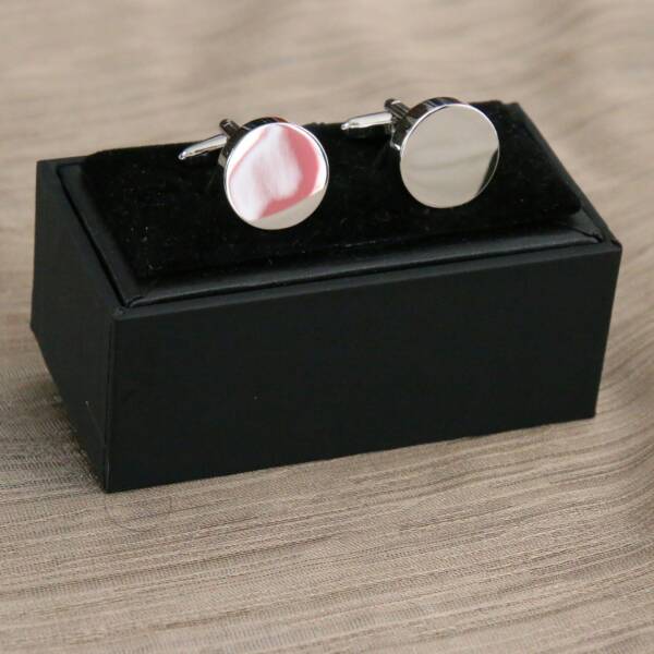 Boutons de manchette ronds argents
