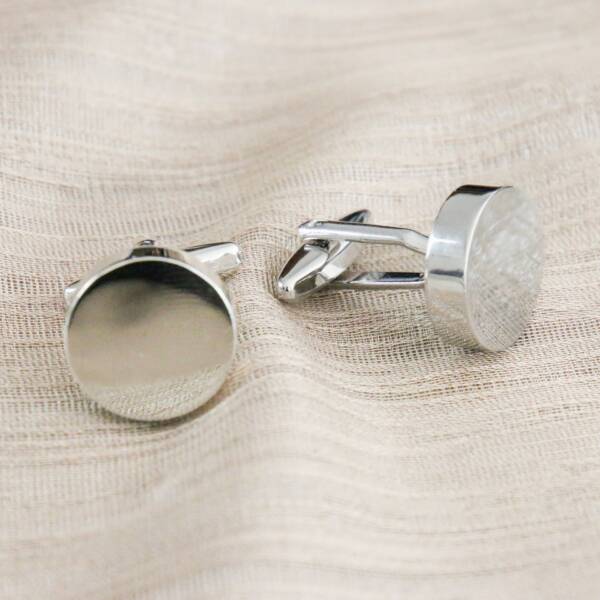 Boutons de manchette ronds argents